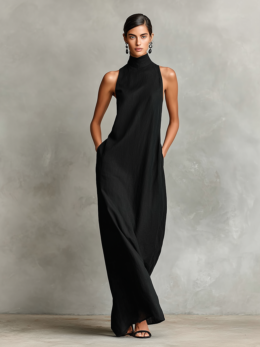 Vestido largo minimalista negro, cuello alto sin mangas, caída envolvente