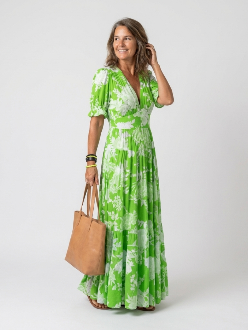 Sonia | Vestido midi de flores, sin mangas y con escote en V