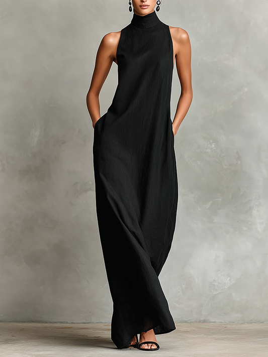 Vestido largo minimalista negro, cuello alto sin mangas, caída recta