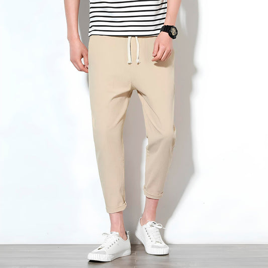 Pantalón cómodo beige con cordón y puños elásticos en el tobillo