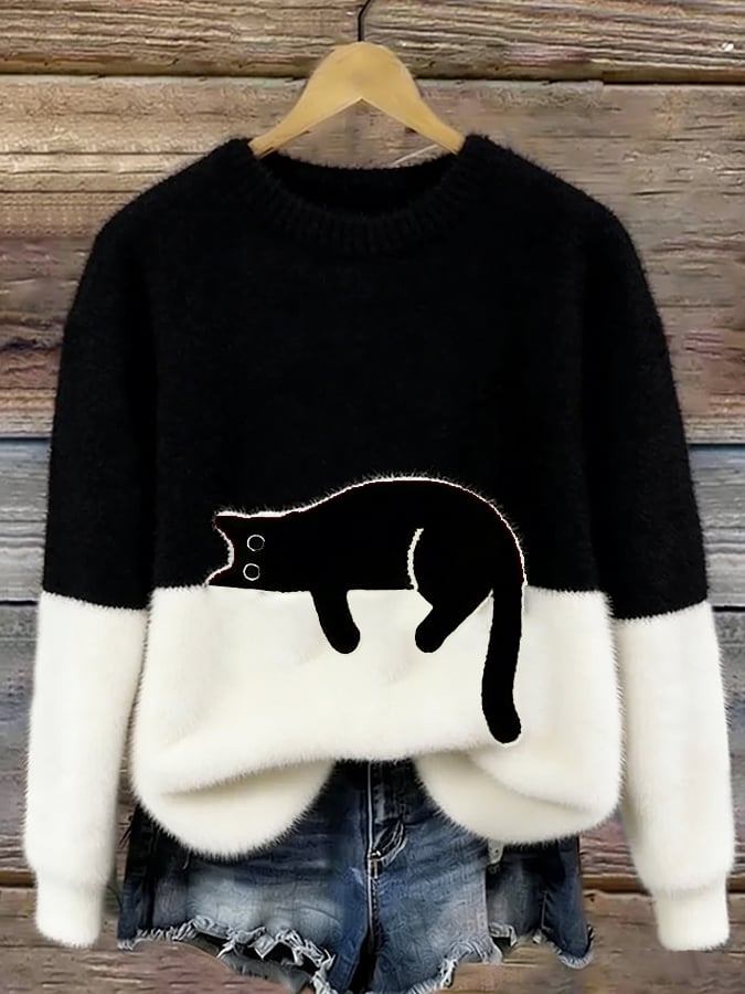 Jersey oversize negro y blanco con dibujo de gato negro