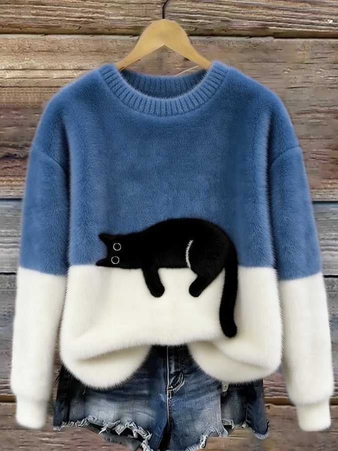 Jersey oversize azul claro y blanco con dibujo de gato negro