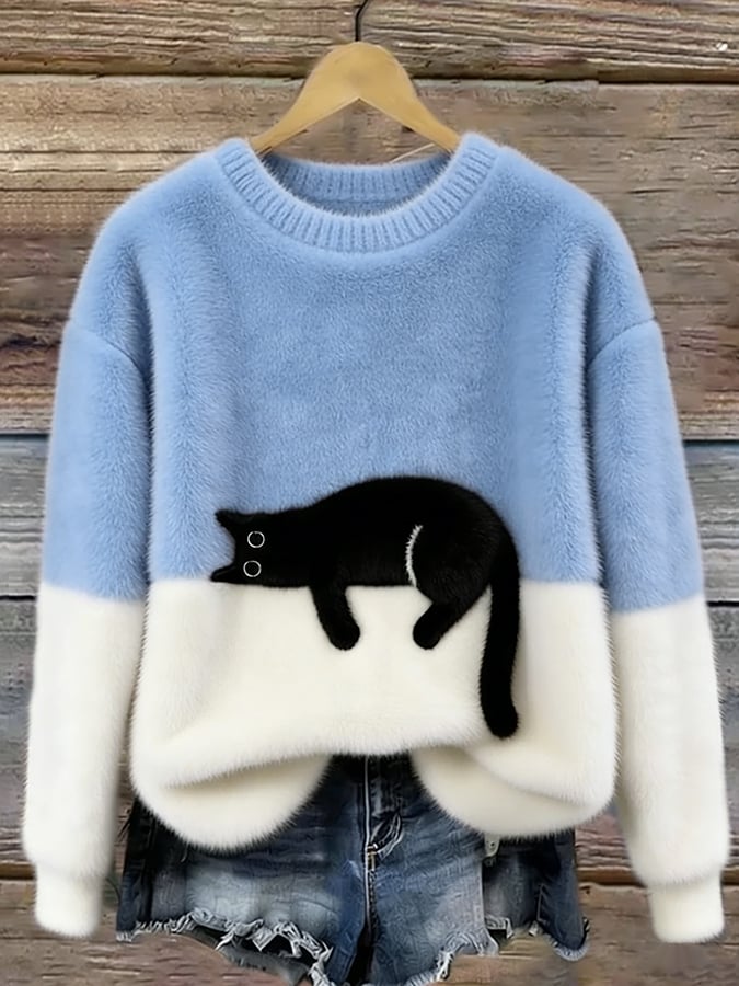Jersey oversize azul claro y blanco con dibujo de gato negro