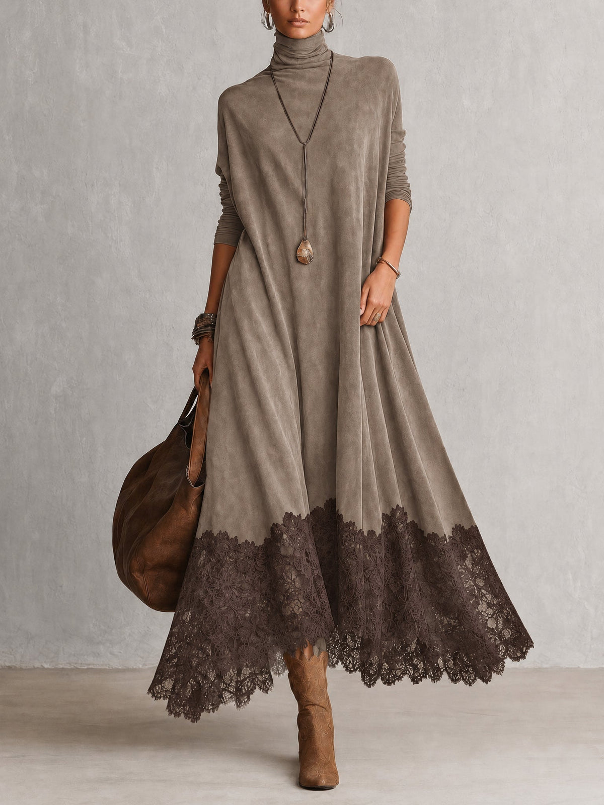 Vestido largo gris efecto ante, cuello alto y bajo asimétrico con encaje oscuro