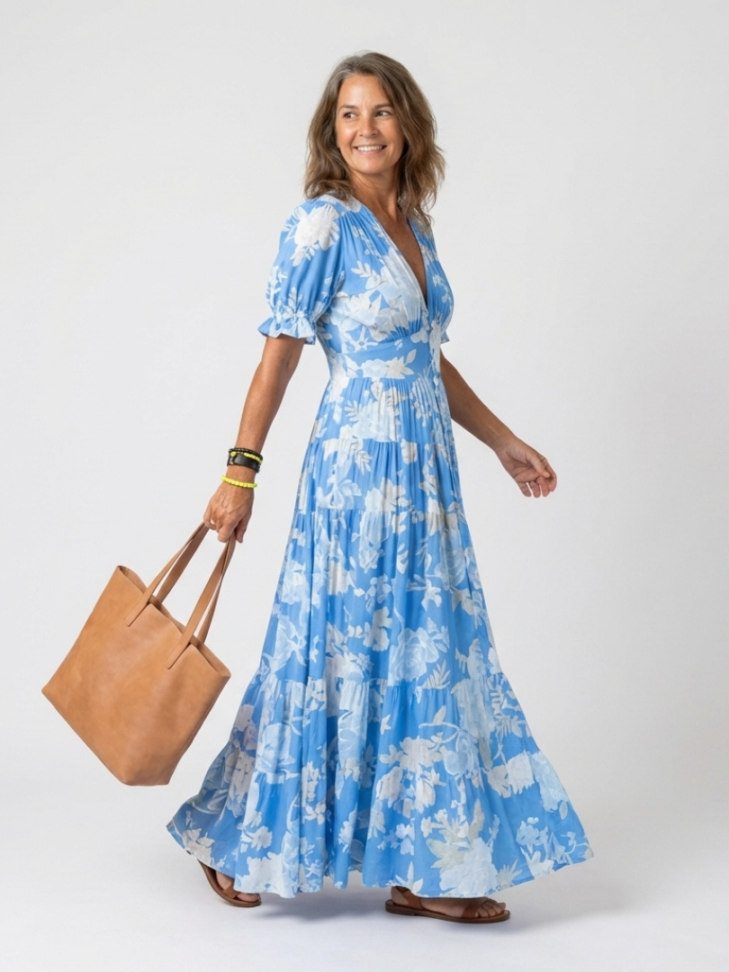 Sonia | Vestido midi de flores, sin mangas y con escote en V