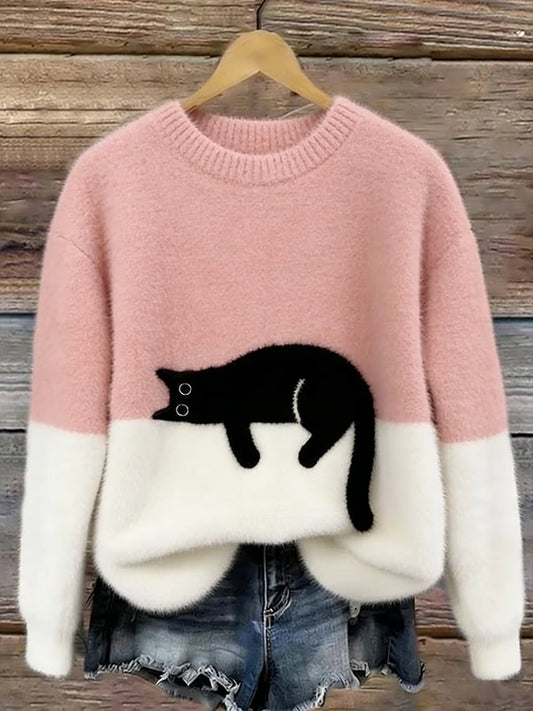 Jersey oversize rosa y blanco con dibujo de gato negro