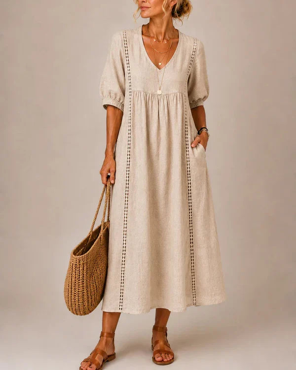 Vestido medio de verano beige con cuello en V, mangas abullonadas y bordado vertical
