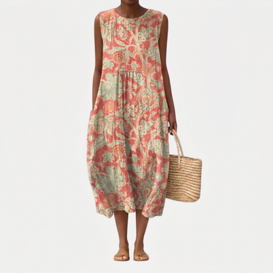Vestido midi sin mangas estampado floral coral y verde, cintura fruncida y caída amplia