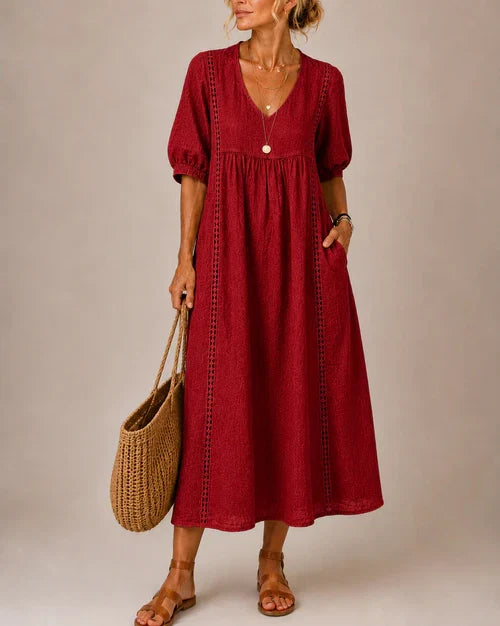 Vestido medio de verano rojo con cuello en V, mangas abullonadas y bordado a lo largo