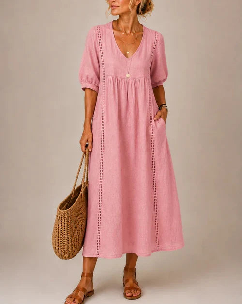 Vestido medio de verano rosa con cuello en V, mangas abullonadas y bordado vertical